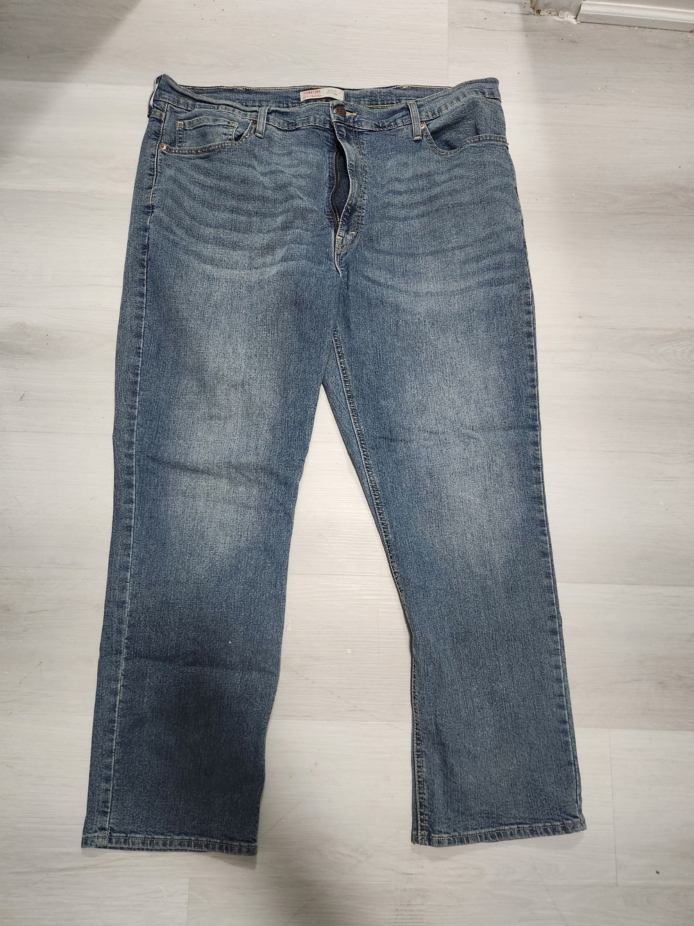 Signature Levi Strauss Athletic Fit Men's Blue Jeans.